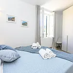 Real Italian Estate - Sunrise Genoa Suite